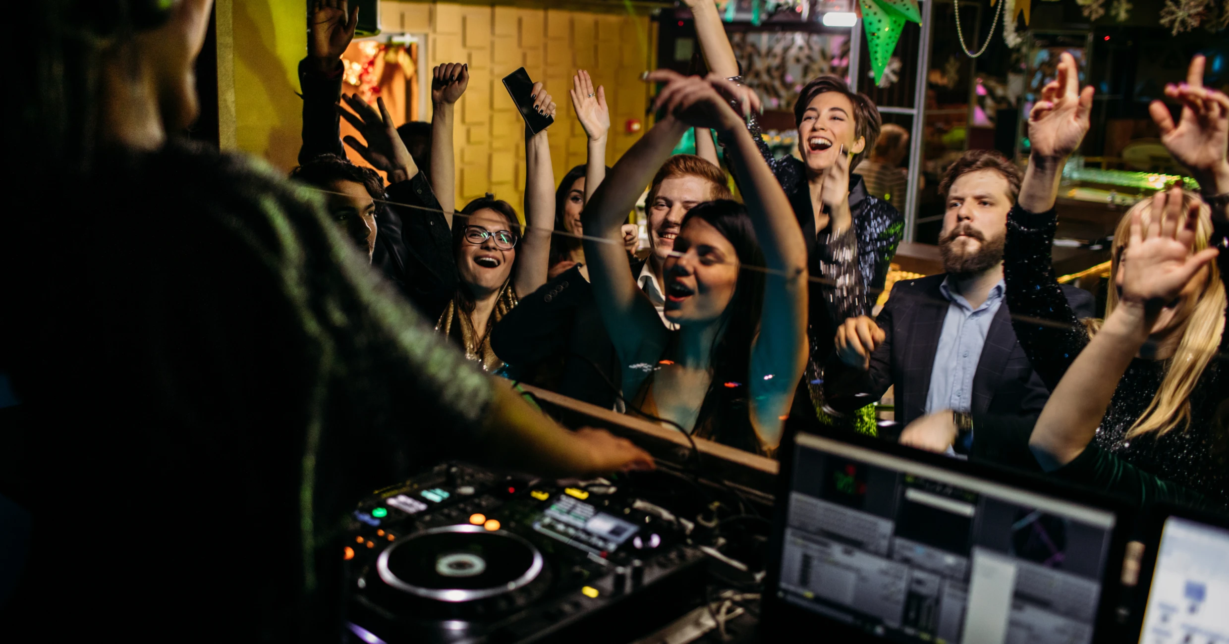 DJ performing at lively nightclub